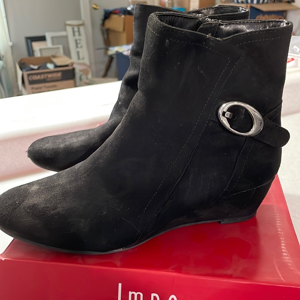 Black wedged boots, size 8.